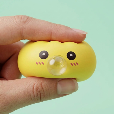 Jumbo Yellow Dumpling Squishy — slow-rise effect, the foam springs back slowly