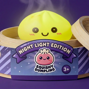 Sunshine Yellow Dumpling Squishy Night Light in its bamboo steamer box