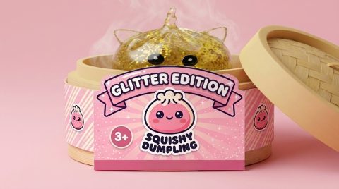 Gold Unicorn Glitter Dumpling Squishy in its bamboo steamer box