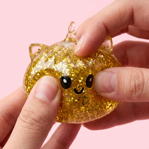 Gold Unicorn Glitter Dumpling Squishy — slow-rise effect, the foam springs back slowly