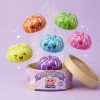 Squishy Dumpling Mystery Happy Faces being squeezed, soft slow-rise foam