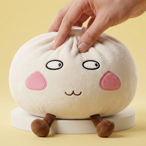 Giant Proud Dumpling Squishy being squeezed, soft slow-rise foam