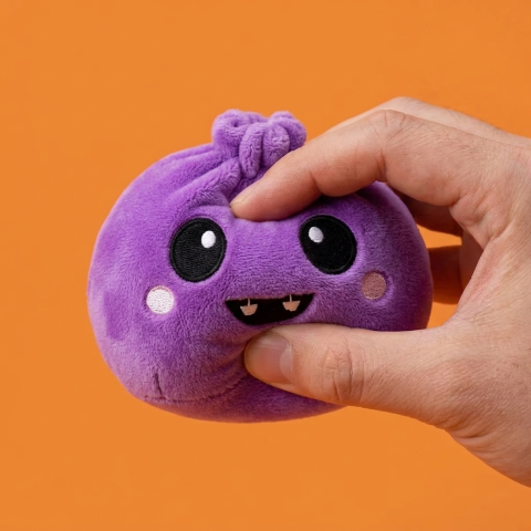 Spooky Halloween Dumpling Squishy Set of 5 being squeezed, soft slow-rise foam