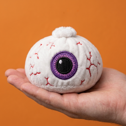 Halloween Eyeball Dumpling Squishy held in hand, actual size