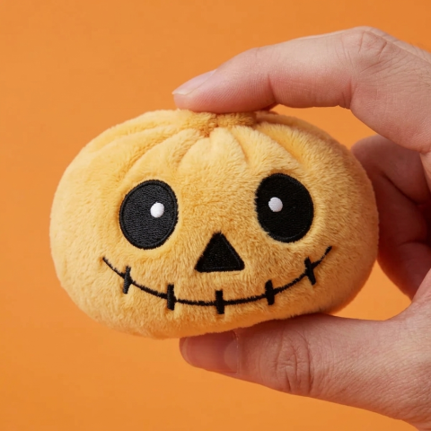 Halloween Skeleton Dumpling Squishy being squeezed, soft slow-rise foam