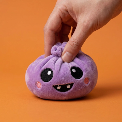 Velvet Vampire Dumpling Squishy Halloween being squeezed, soft slow-rise foam