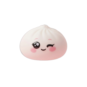 White Wink Dumpling Squishy being squeezed, soft slow-rise foam